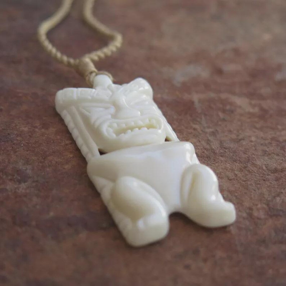 Tiki Carved Pendant
