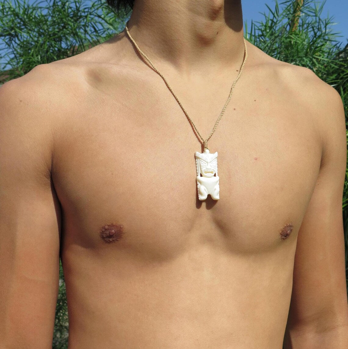 Tiki Carved Pendant