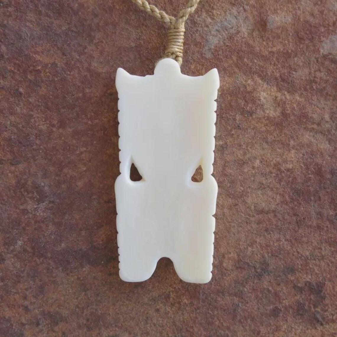 Tiki Carved Pendant